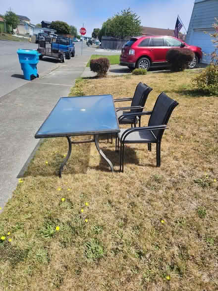 Photo of free glass top Table & 4 Chairs (3311 Cottage st. Eureka) #1