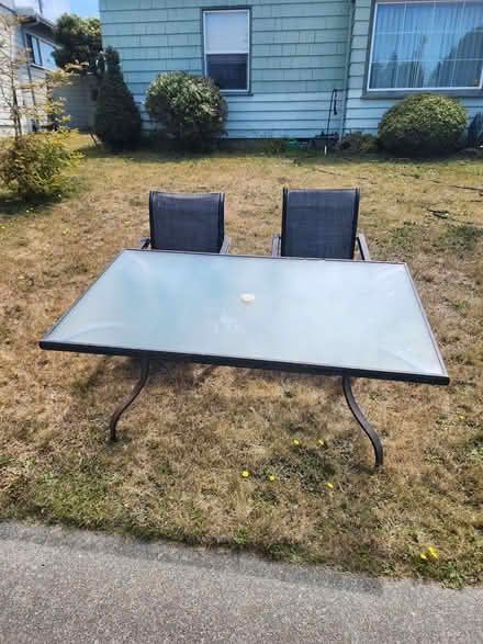 Photo of free glass top Table & 4 Chairs (3311 Cottage st. Eureka) #2