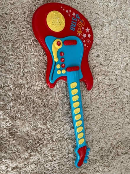 Photo of free Toy guitar (Carshalton) #1