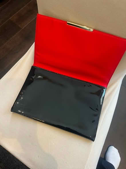 Photo of free Black patent clutch bag with red lining (Lavender Hill SW11) #2