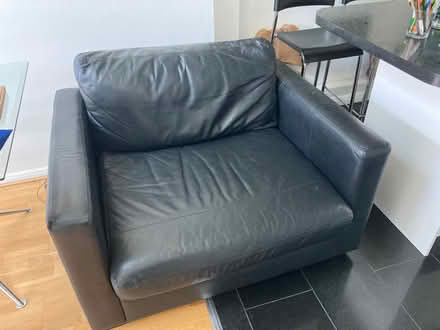 Photo of free Black leather “snuggler” chair (Turnford EN8) #1