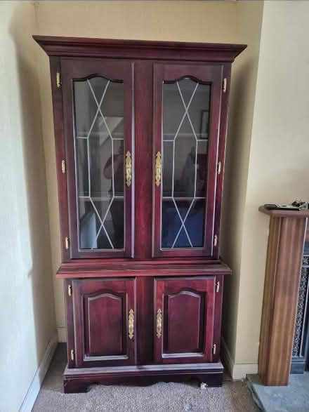 Photo of free Tall dark wood cabinet (DE21) #1