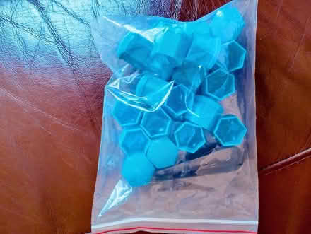 Photo of free 19mm wheel nut covers (Knotty Ash) #1