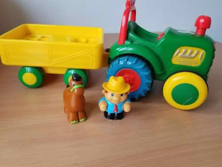 Photo of free Plastic tractor toy with 2 figures (Gloucester) #1
