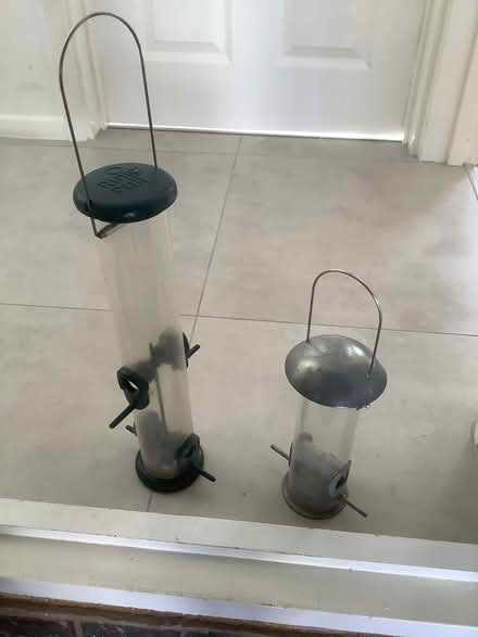 Photo of free 2 bird feeders. (Horsell GU21) #1