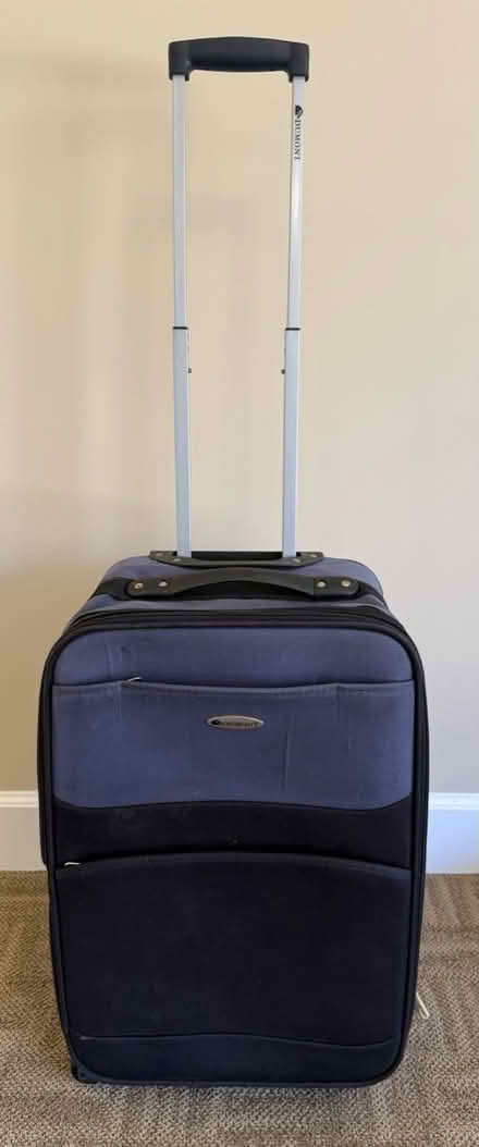 Photo of free Dumont carry-on rolling suitcase (1075 Valencia Avenue) #1