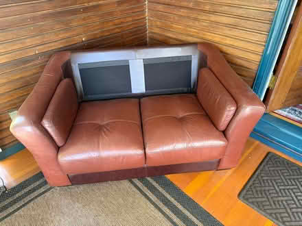 Photo of free Leather Loveseat w/ no back cushion (Midtown Sacramento 95816) #1