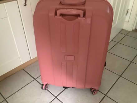 Photo of free Large pink roller suitcase (Wandsworth SW11) #2