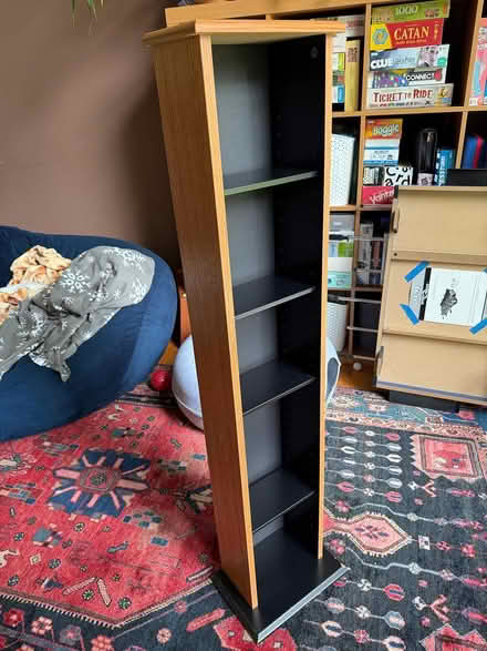 Photo of free Narrow media shelving (Carrboro south of Hwy 54) #1