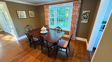 Photo of free Wood dining room table and chairs (Rockville) #1