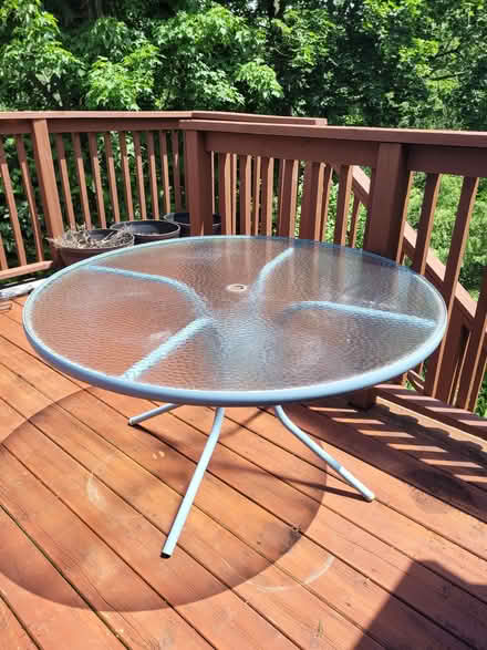 Photo of free Glass-topped outdoor table (East City) #1