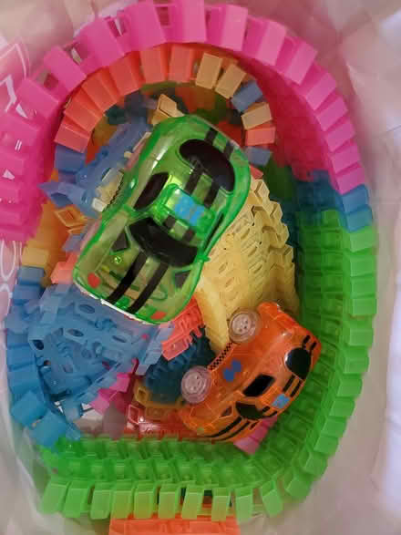 Photo of free Toy tracks with 2 race cars (Near Experimental Farm) #1