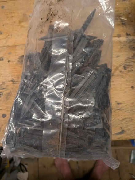 Photo of free Bag of plastic pegs (Godalming) #1