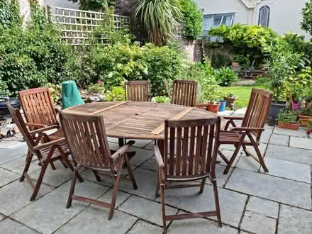 Photo of free Large solid wood table and 3 chairs (Clifton BS8 2UL) #1