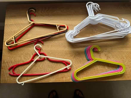 Photo of free Assorted coat hangers - about 20 (St John's TN13) #1