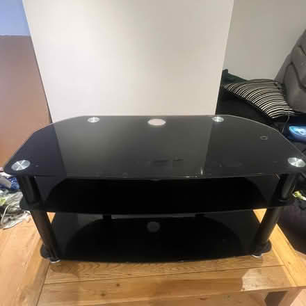 Photo of free Black Glass TV stand (Church RG2) #2