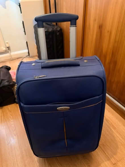 Photo of free 2 suitcases black and blue (N4 1HG) #2
