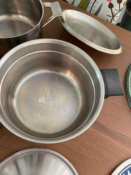 Photo of free 4 pans with lids, two large, two medium plus large colander. (Aigburth L17) #1