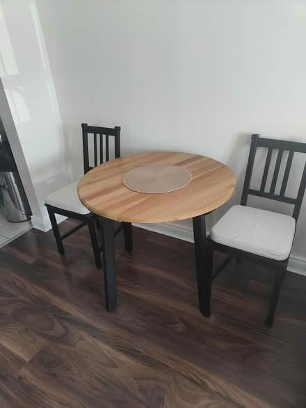 Photo of free Dining table & 2 chairs (Swords) #1