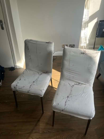 Photo of free 2 white marble coated dining chairs (SE14 new cross) #1