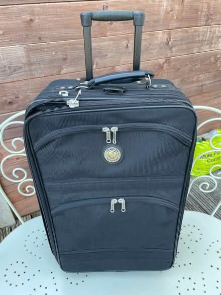 Photo of free Small black two-wheeled suitcase (Talbot Village BH10) #1