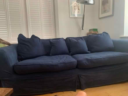 Photo of free Large dark blue sofa with loose covers (Ledbury HR8) #1