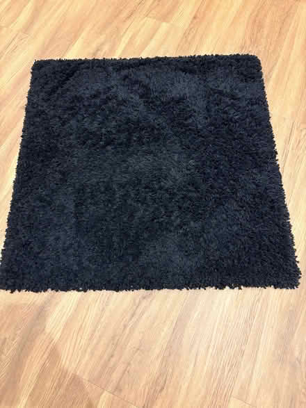 Photo of free Black square rug (Hertford Heath SG13) #1