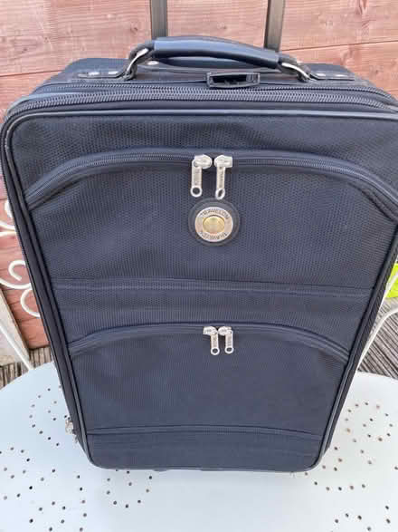 Photo of free Small black two-wheeled suitcase (Talbot Village BH10) #3
