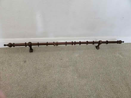 Photo of free Dark wood curtain pole (Welling DA16) #1