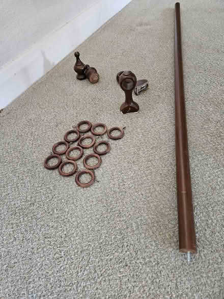 Photo of free Dark wood curtain pole (Welling DA16) #2