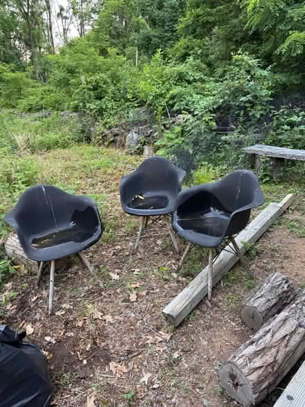 Photo of free Four plastic black chairs (West Amwell NJ) #1
