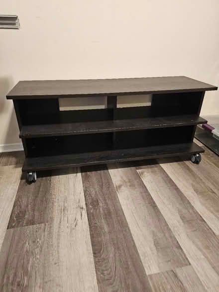 Photo of free Black rolling entertainment center (Gaitherburg) #2