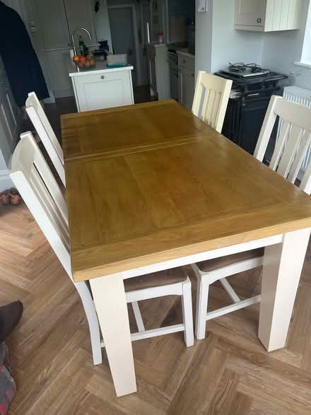 Photo of free Extendable solid wooden dining table & 4 matching chairs (Bramhall SK7) #1