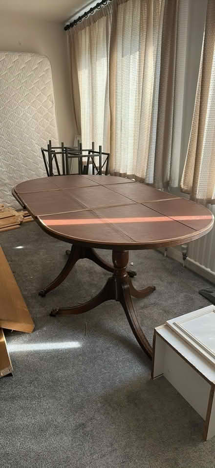 Photo of free Wood dining table (SL0 0pt) #1