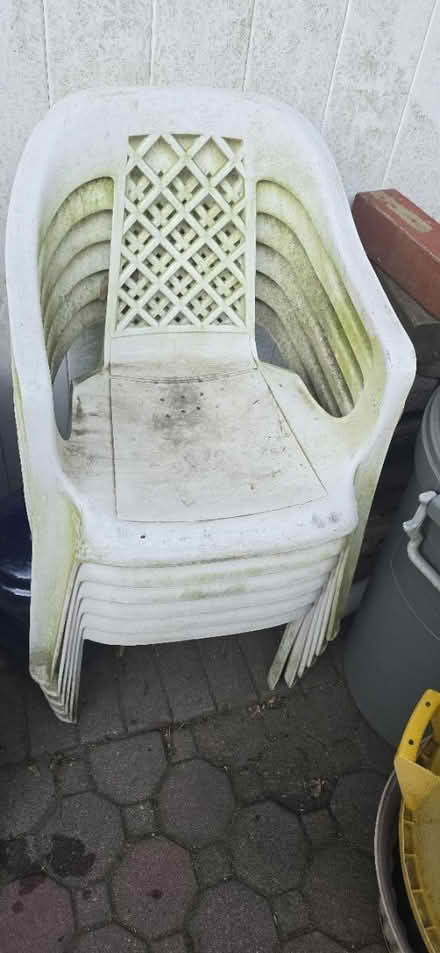 Photo of free 6 plastic chairs. Need cleaning (132 Chester Ave, Mass.Park NY) #1