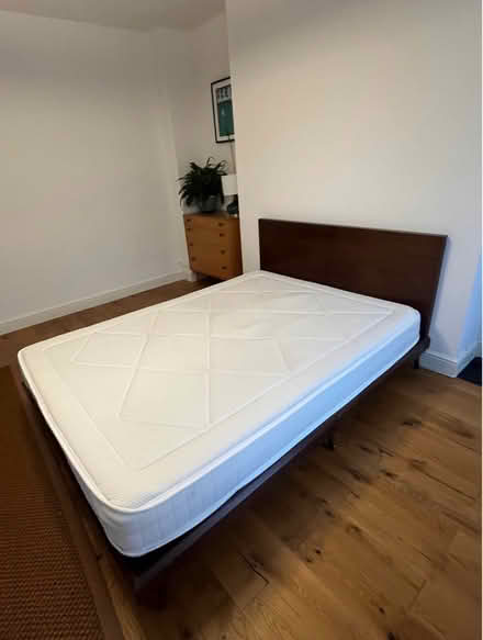 Photo of free Wooden bed frame (king size) (E11) #1