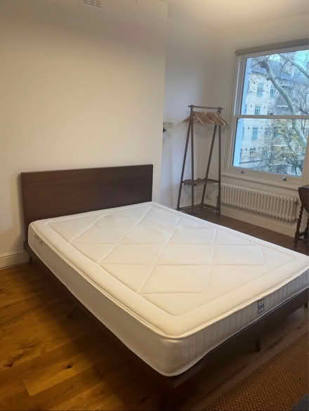 Photo of free Wooden bed frame (king size) (E11) #2