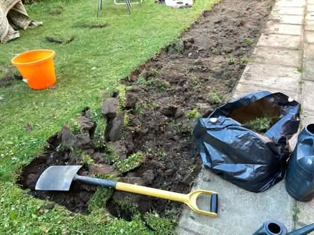 Photo of free top soil rim back garden (L7) #3