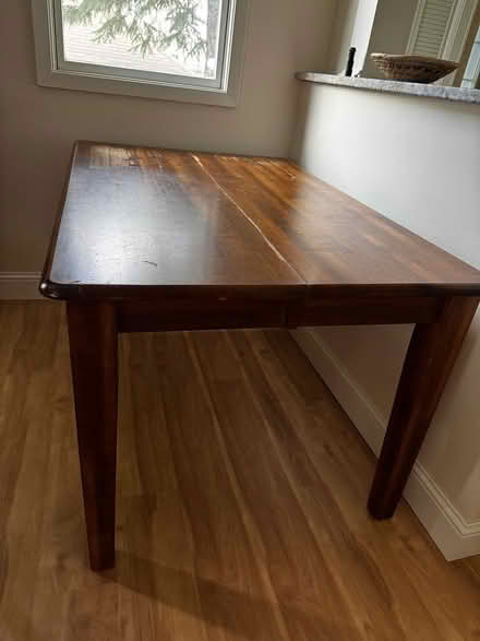 Photo of free Sturdy wooden dining table (St. Paul Mac groveland) #1