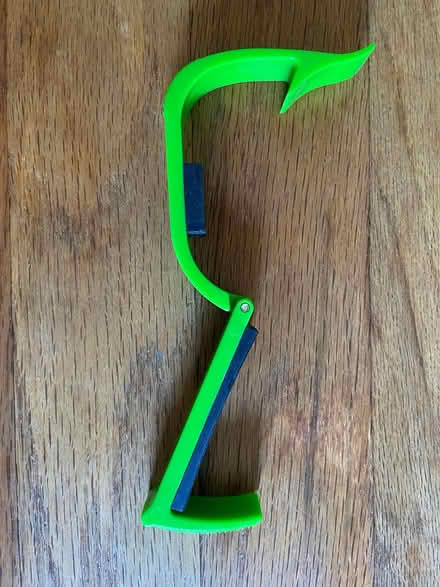 Photo of free Green plastic capo (Ann Arbor Northwest Side) #3