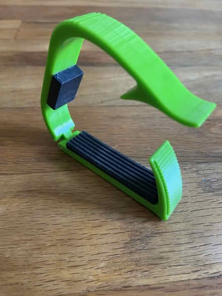 Photo of free Green plastic capo (Ann Arbor Northwest Side) #2