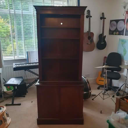 Photo of free Mahogany veneer shelving unit (Portslade) #1