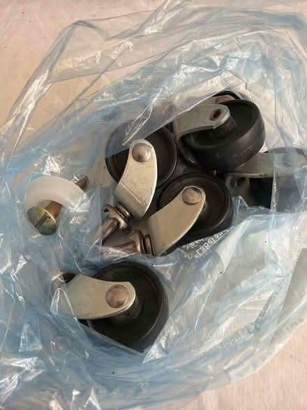 Photo of free 6 castor wheels/ 2 headboard screws (Shirley, Croydon) #2