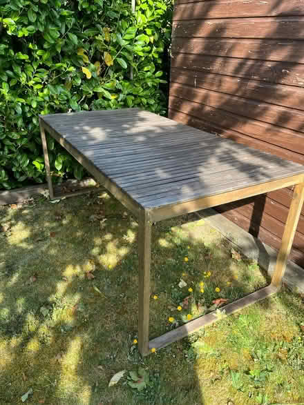 Photo of free Acacia wood garden table (“Lennox” table by Laura James) (Dane Mead RG24) #2