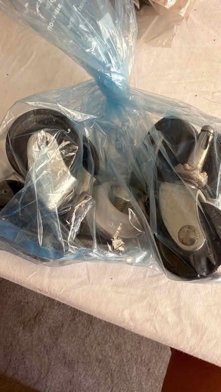 Photo of free 6 castor wheels/ 2 headboard screws (Shirley, Croydon) #1