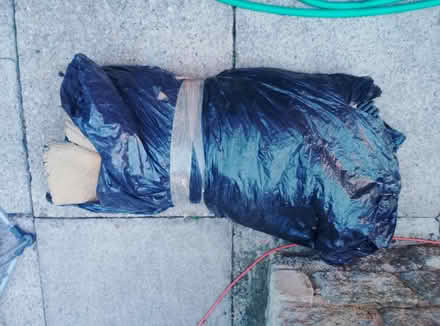 Photo of free Black bag of old rubber backed underlay (Farmoor OX2) #1