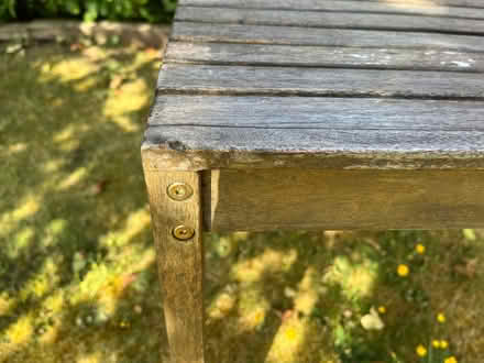 Photo of free Acacia wood garden table (“Lennox” table by Laura James) (Dane Mead RG24) #4