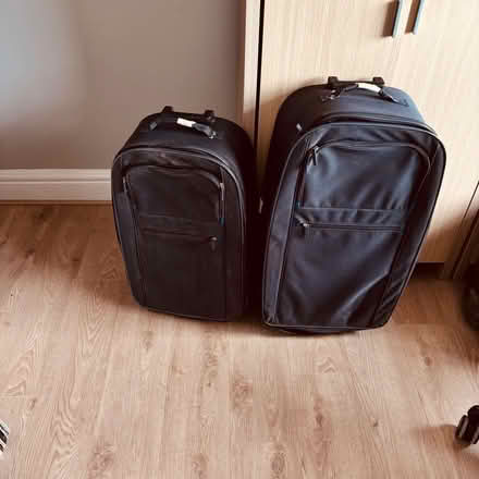 Photo of free A medium and large suitcase (Oxton CH43) #1