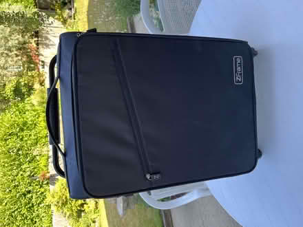 Photo of free Black roller long suitcase. (North Ascot SL5) #1