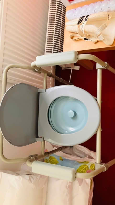 Photo of free New toilet chair with pot and lid (Colchester CO4) #1